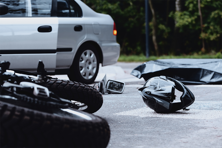 Crash between motorcycle and car