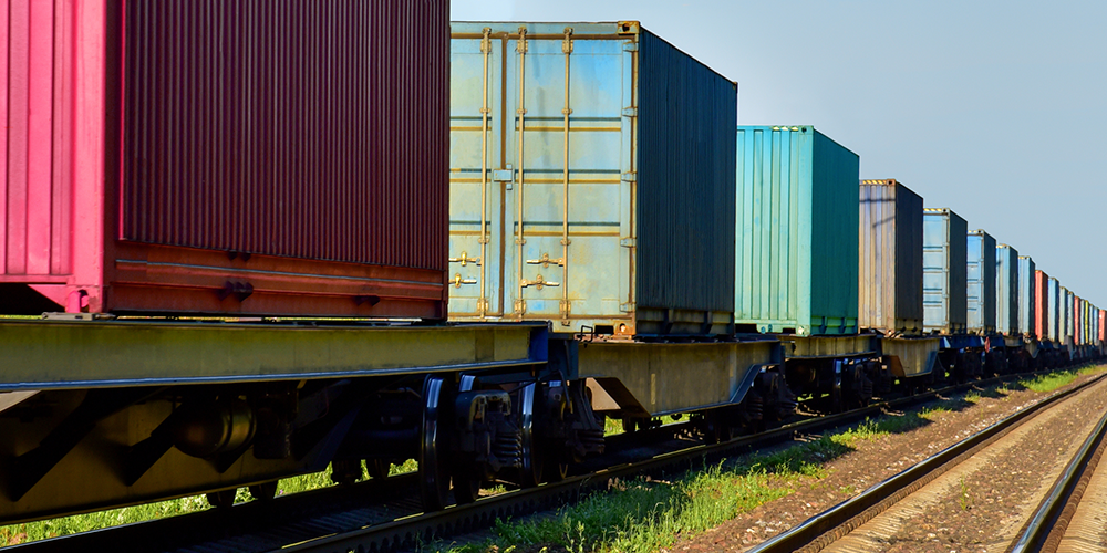 Cargo containers on freight rail