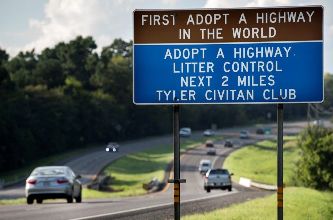First adopt a highway sign