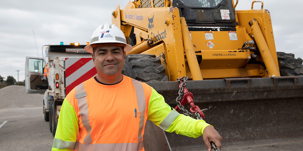 TxDOT personnel with equipment