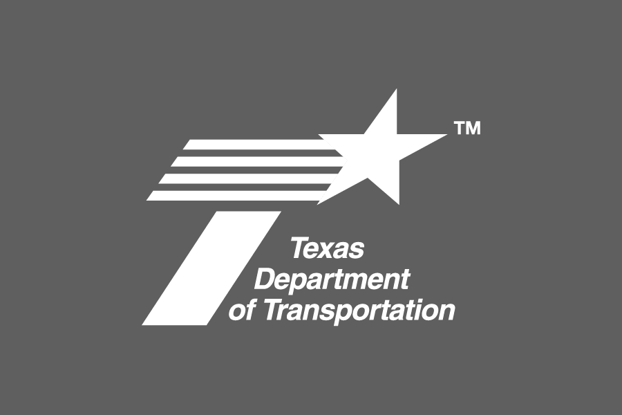 Logotipo de TxDOT blanco sobre gris