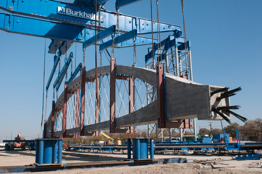 Cranes raising a section of bridge