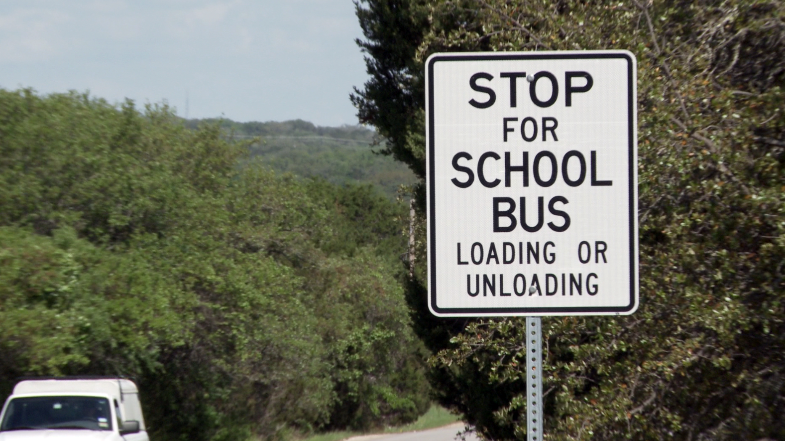 Bus stop loading sign