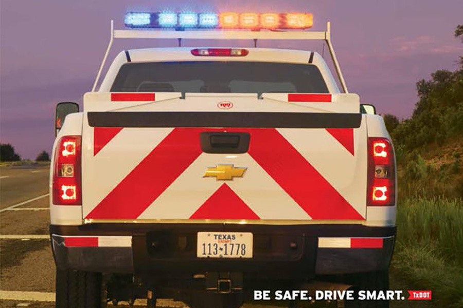 TxDOT truck with light bar: Be safe. Drive smart.