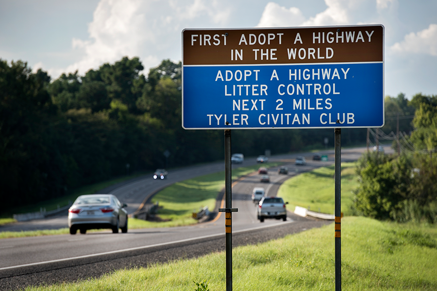 Tyler adopt a highway sign