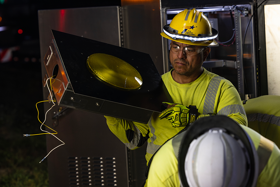 TxDOT Beaumont (BMT) workers install a dynamic messaging sign (DMS) on I-10 near Vidor. The job was completed between 7pm and 3am.