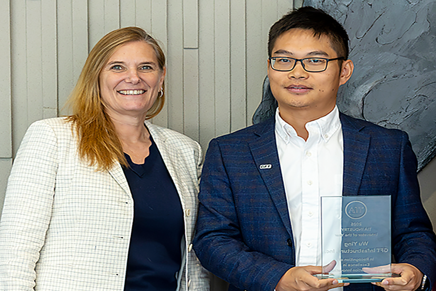 TIA Industry Innovator of the Year Award winner, Wu Ying of GFT Infrastructure, with Erika Kemp, Strategic Initiatives and Innovation Division Director.