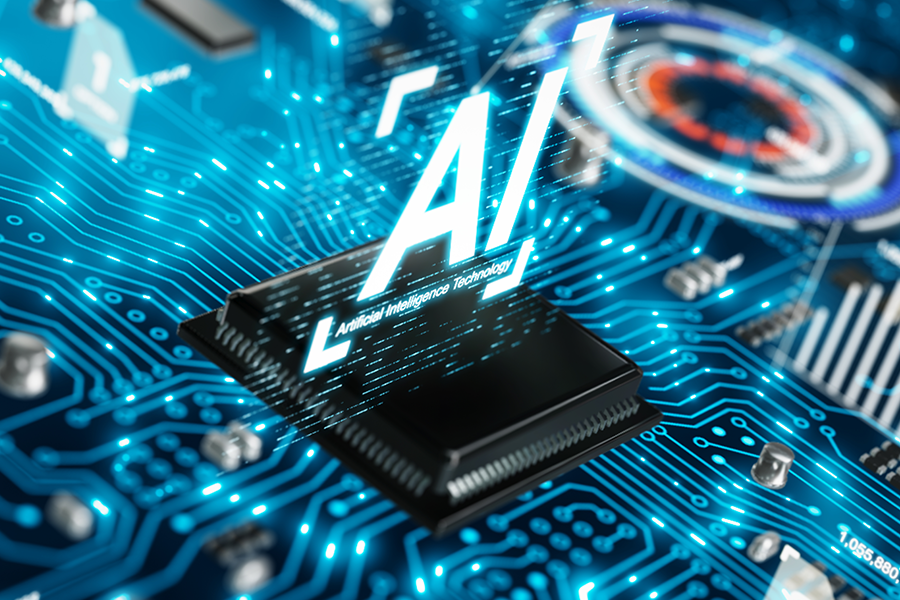 A high‑tech digital illustration depicting a microchip on a circuit board with glowing blue traces. Above the chip, the letters “AI” appear as a holographic projection, symbolizing artificial intelligence processing.