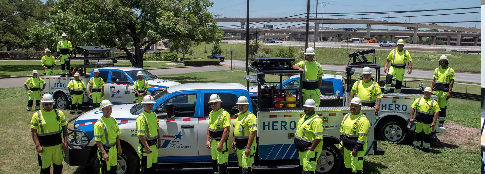 Emergency response workers outside of HERO vehicles