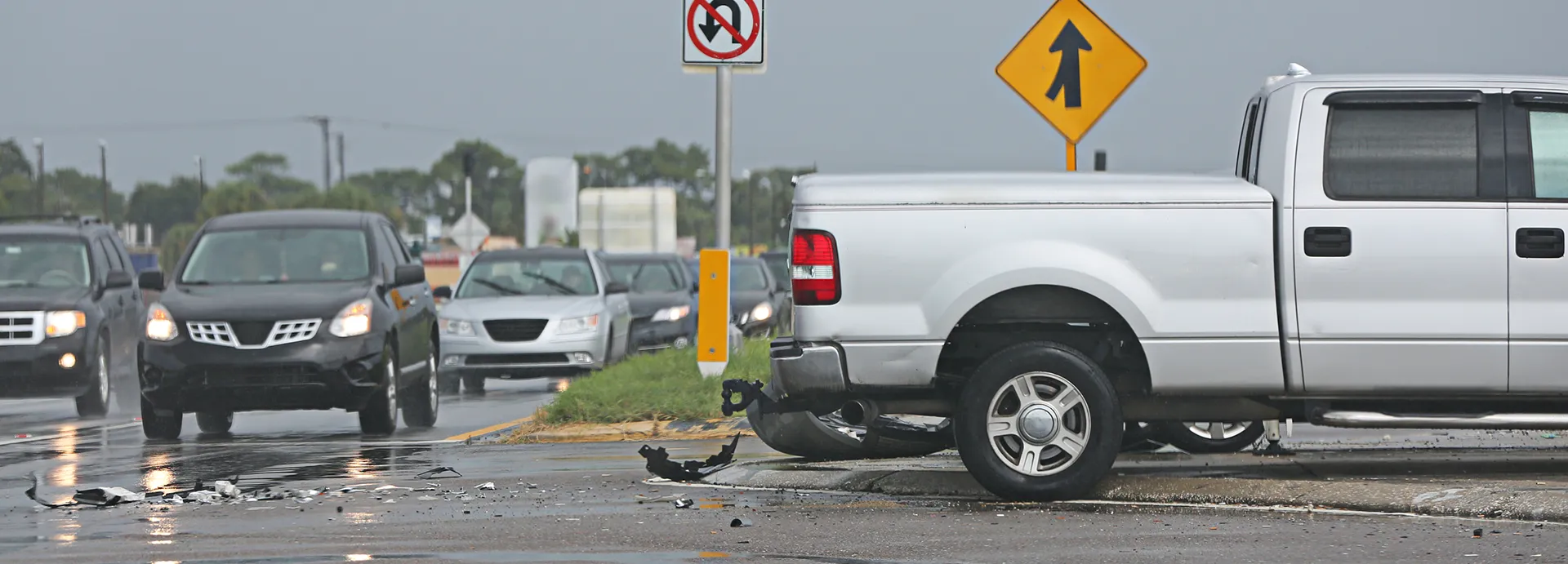 Intersection traffic accident silver truck