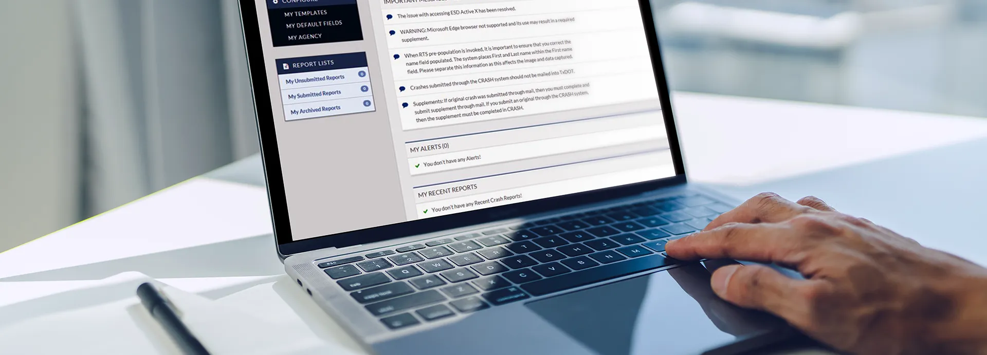 Person accessing crash panels laptop
