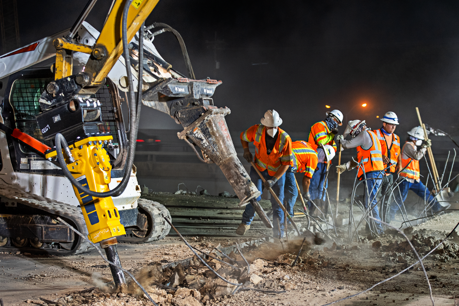 Construction workers at night