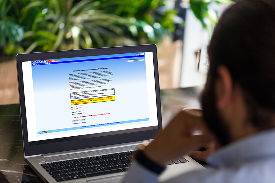 Person accessing CCIS system on laptop