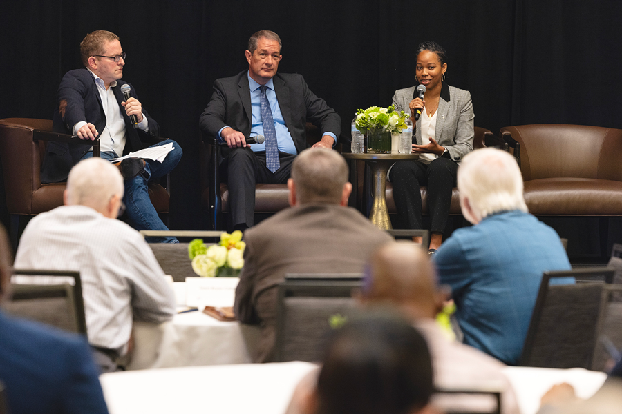 Moderator David Zipper of MIT Mobility Initiative speaks with Justine Johnson of MEDC and Jim Perschbach of Port SA during a “Fireside Chat” at the Innovation Invitational conference.