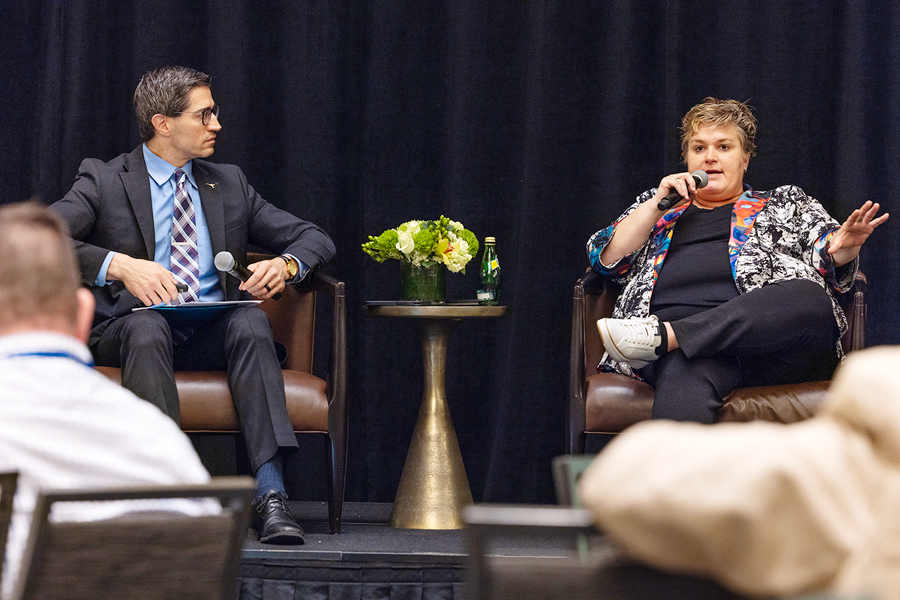 Moderator Carlo Capua from City of Fort Worth speaks to Monica Paul of Dallas Sports Commission during a panel at the Innovation Invitational conference.