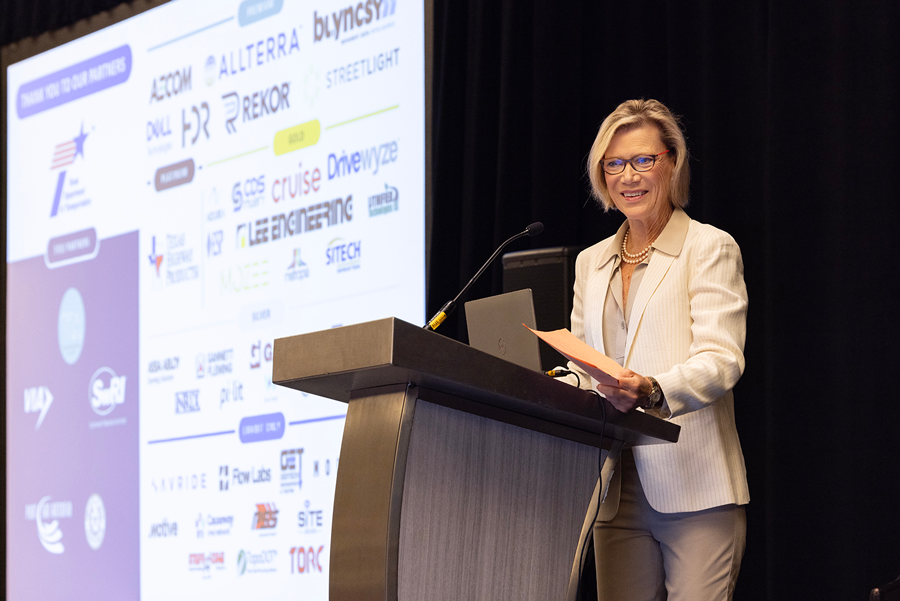 Shelley Row of Blue Fjord Leaders serves as emcee of the Innovation Invitational conference, hosted by TxDOT STR and UT Center for Transportation Research (CTR), at the Grand Hyatt River Walk in San Antonio. 