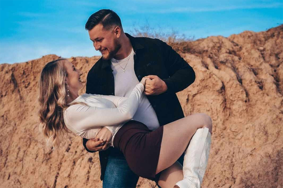 Nicholas Martin and wife dance pose