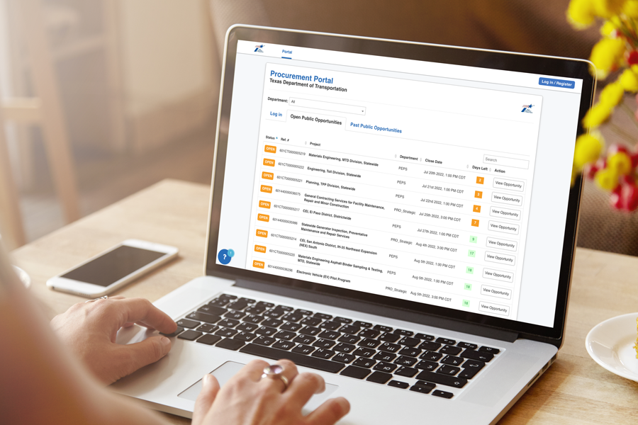 Laptop with procurement portal on screen