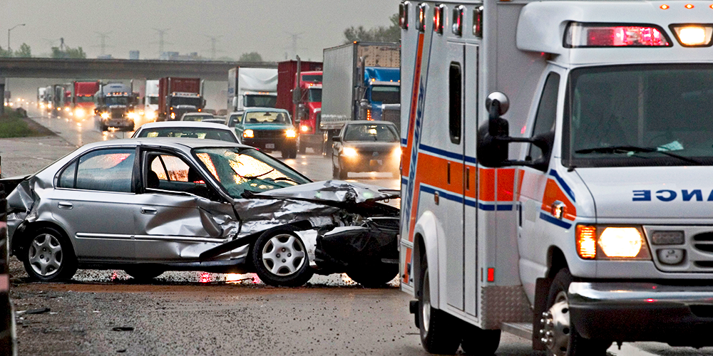 Vehicle accident on highway with ambulance