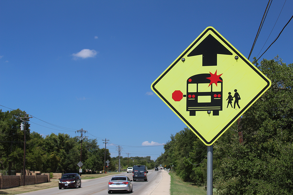 Yellow school bus sign