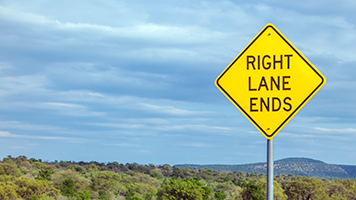 Yellow "Right Lane Ends" sign