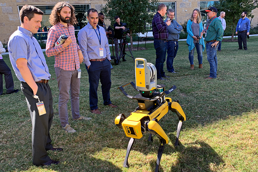 TxDOT employees viewing robot dog