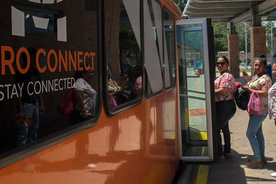 Passengers boarding bus