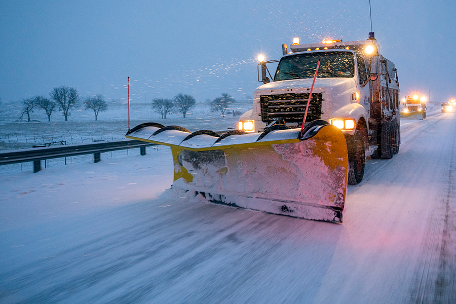 snow plow plows snow on highway SnowUS380_002