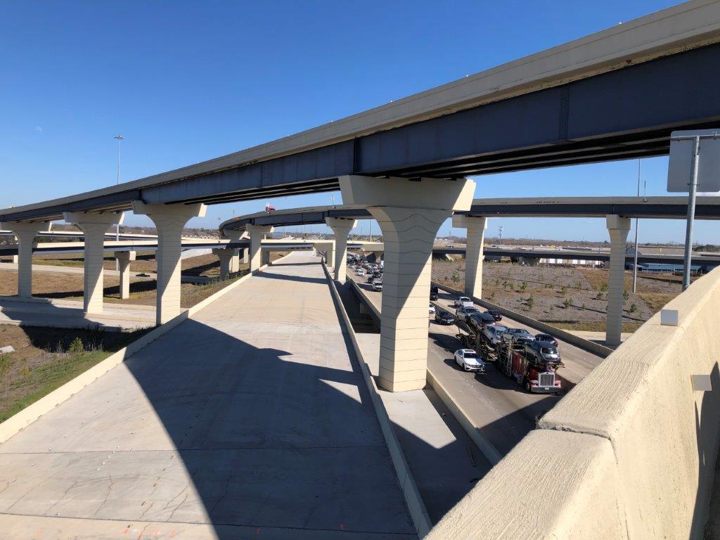 Looking east at I-610  westbound mainlane traffic from connector G.