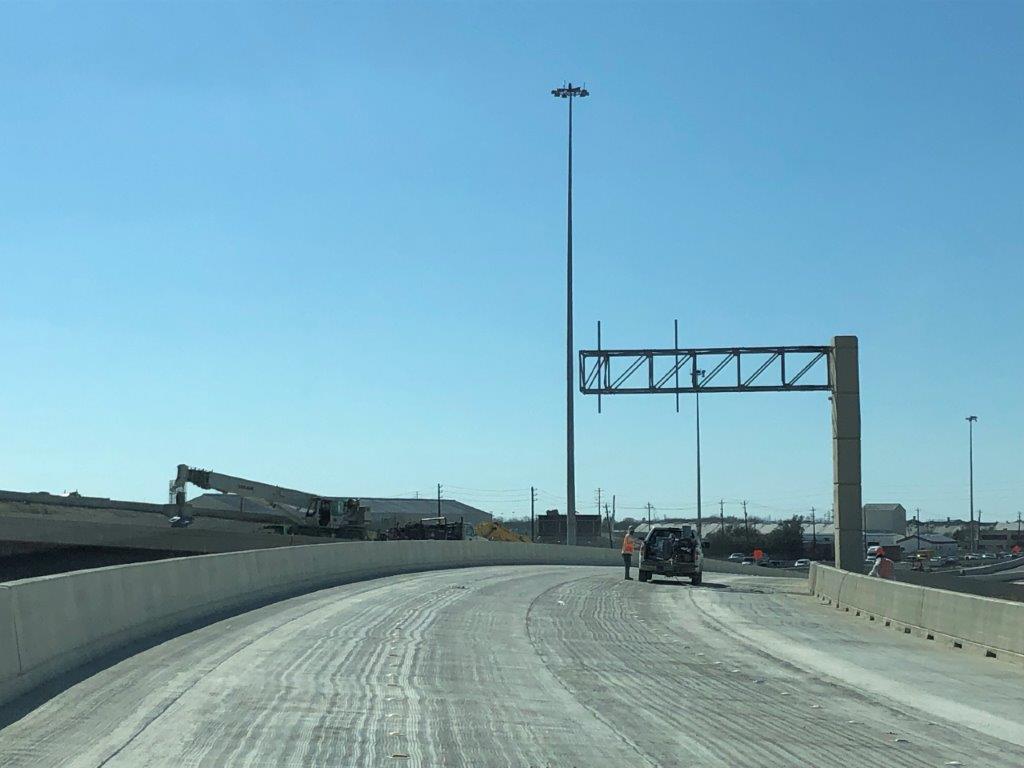 Looking west on connector D coming from SH 288 southbound.
