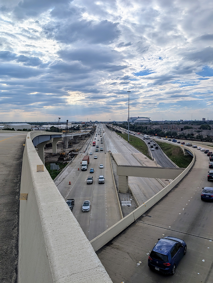 Westbound view of I-610 eastbound mainlane traffic (center) in the new semi-final configuration.