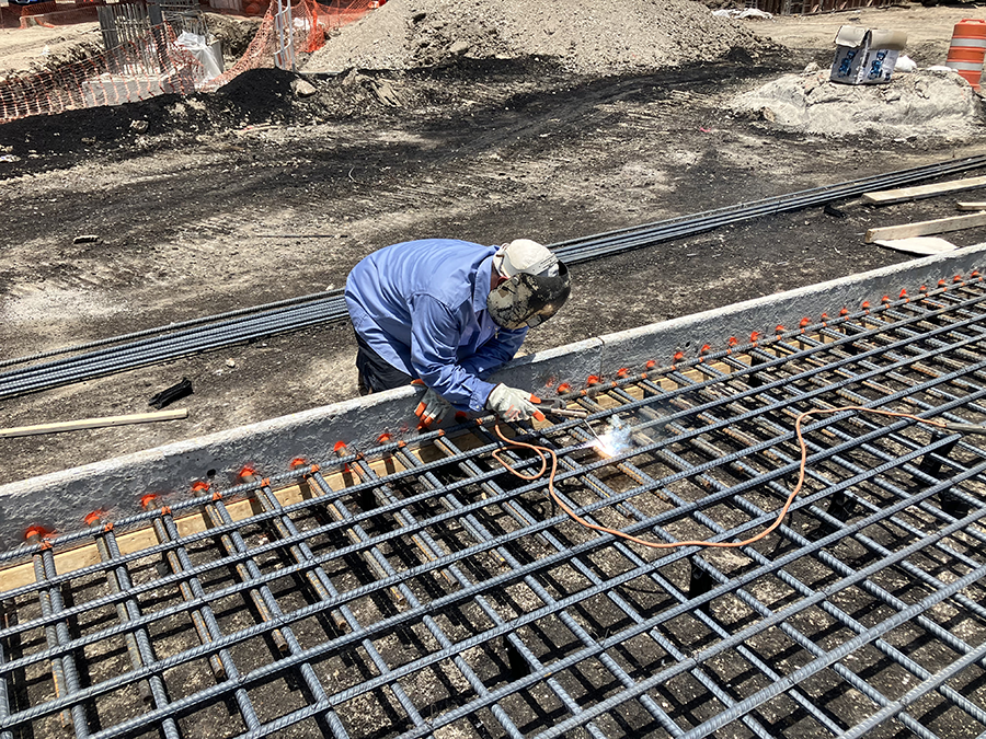 Steel preparation for concrete paving at I-610
