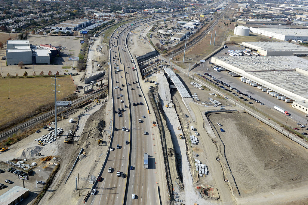 Aerial view of I-635 East at McCree- Rd and executive Dr. Construction of piers, overpass, ramp, bridge, frontage road, lanes, expansions, descking, closures, and detours in 2021.