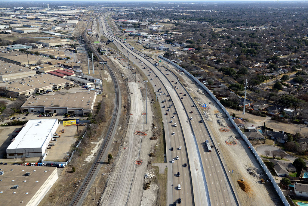 Aerial view of I-635 East at Royal Ln and Plano Rd.Construction of ramp, frontage road, lanes, expansions, closures, and detours in 2021.