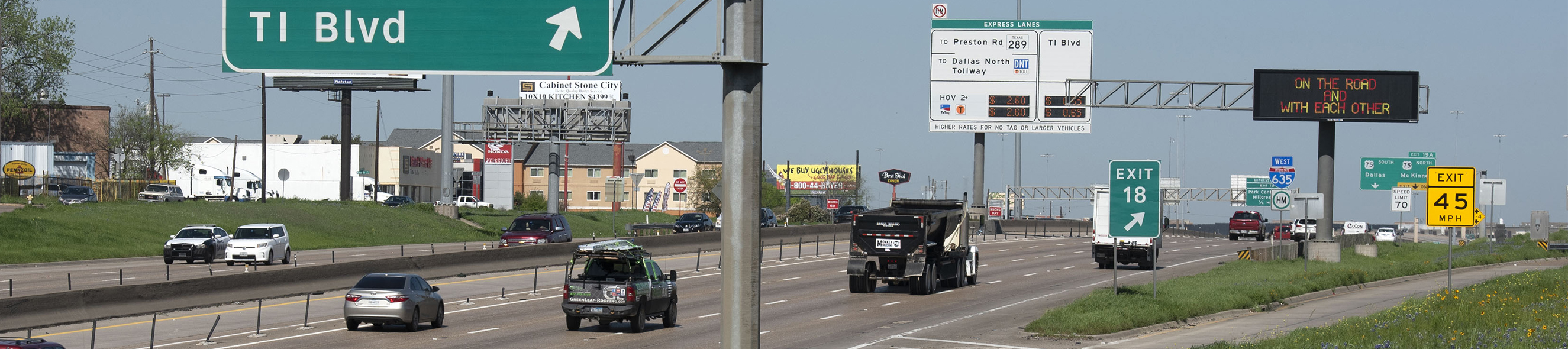 Westbound I-635 Greenville Avenue and TI Boulevard exit in Dallas, Texas.