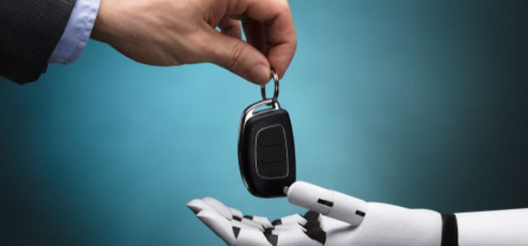 human hand handing keys to robot hand
