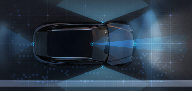 3D image of top view of self-driving SUV with sensing graphic pattern 