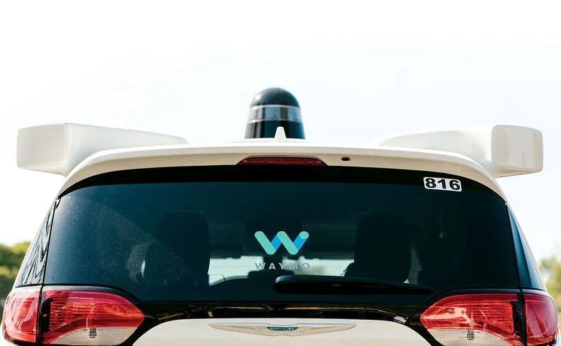 rear windshield of Waymo car