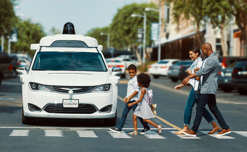 autonomous car stopped to let family cross street