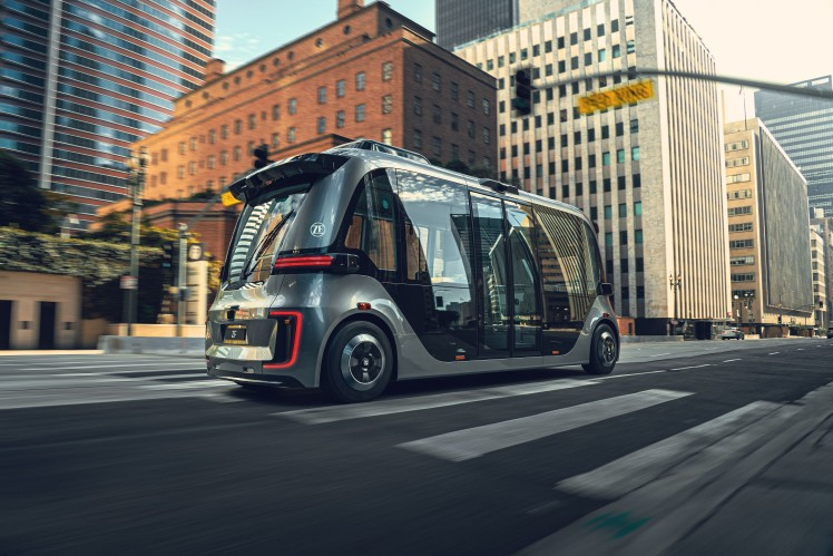 autonomous bus prototype on city street