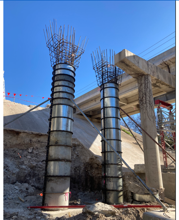 Northbound I-35 frontage road at Walnut Creek bridge column setting - February 2024