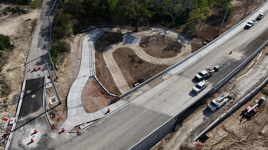 Oak Hill Parkway crews recently began pouring concrete for a portion of shared-use path near Hill Oaks Drive. This section of shared-use path will provide direct access between US 290 and SH 71 through a pedestrian tunnel that passes underneath bridge structures near the "Y" interchange. 