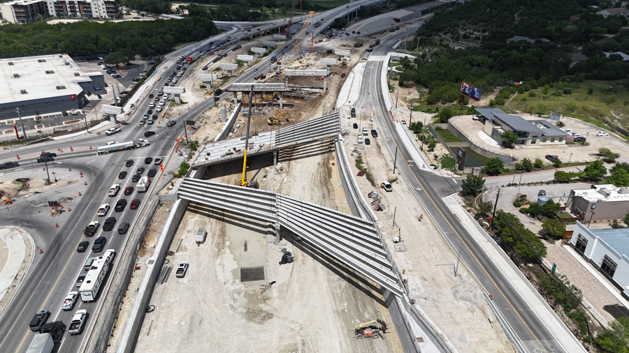 Oak Hill Parkway crews recently placed beams and began deck construction for two ramp brides that will serve the US 290/SH 71 "Y" interchange. In the final configuration, these bridges will lead to and from a Single Point Urban Interchange (SPUI), which will improve traffic flow and safety for drivers accessing local businesses along the two major roadways. July 2025