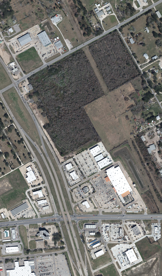 Aerial image of Grand Parkway Segment B-1 area in 2026 prior to construction beginning, showing a roadway intersection.