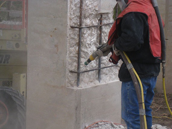 Abrasive blasting to clean reinforcing of rust/active corrosion. (click in image to see full-size image)