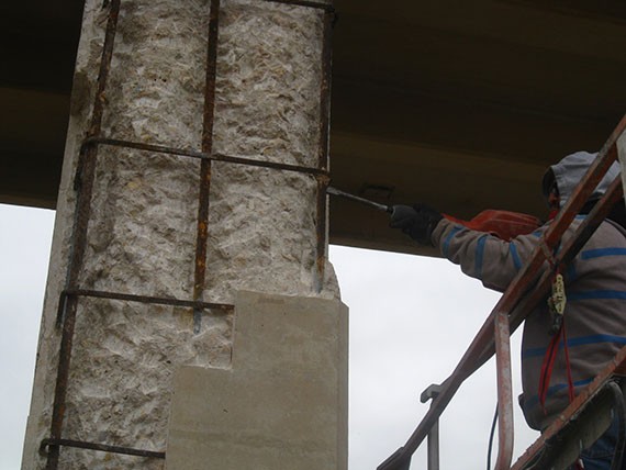 Chipping hammer used to remove unsound concrete. (click in image to see full-size image)