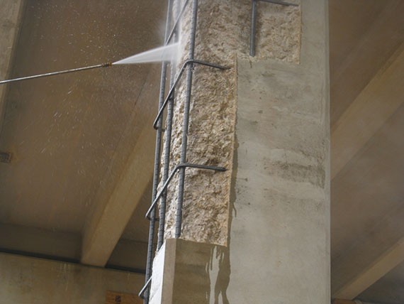 Pressurized water to clean and prepare surface (saturated surface dry). (click in image to see full-size image)