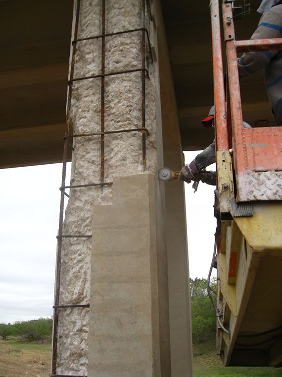 Preparation (saw-cutting) straight and squared edges to contain repair material. (click in image to see full-size image)