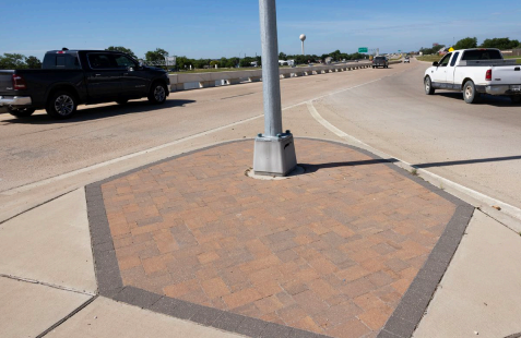 Adding color to traffic islands improves visibility and delineates travel lanes.
