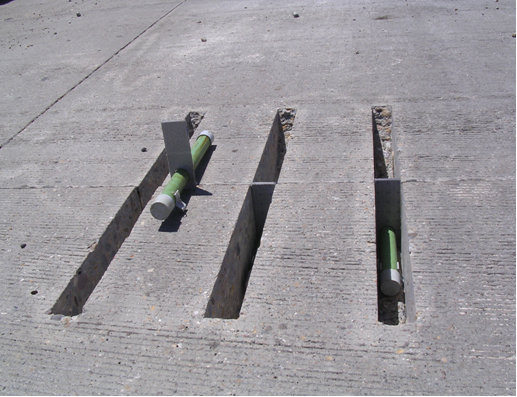 Dowel bar in place for backfill materialapplication. (click in image to see full-size image)